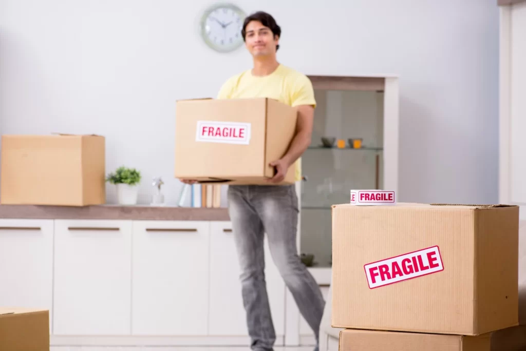 a men handling parcel for moving service